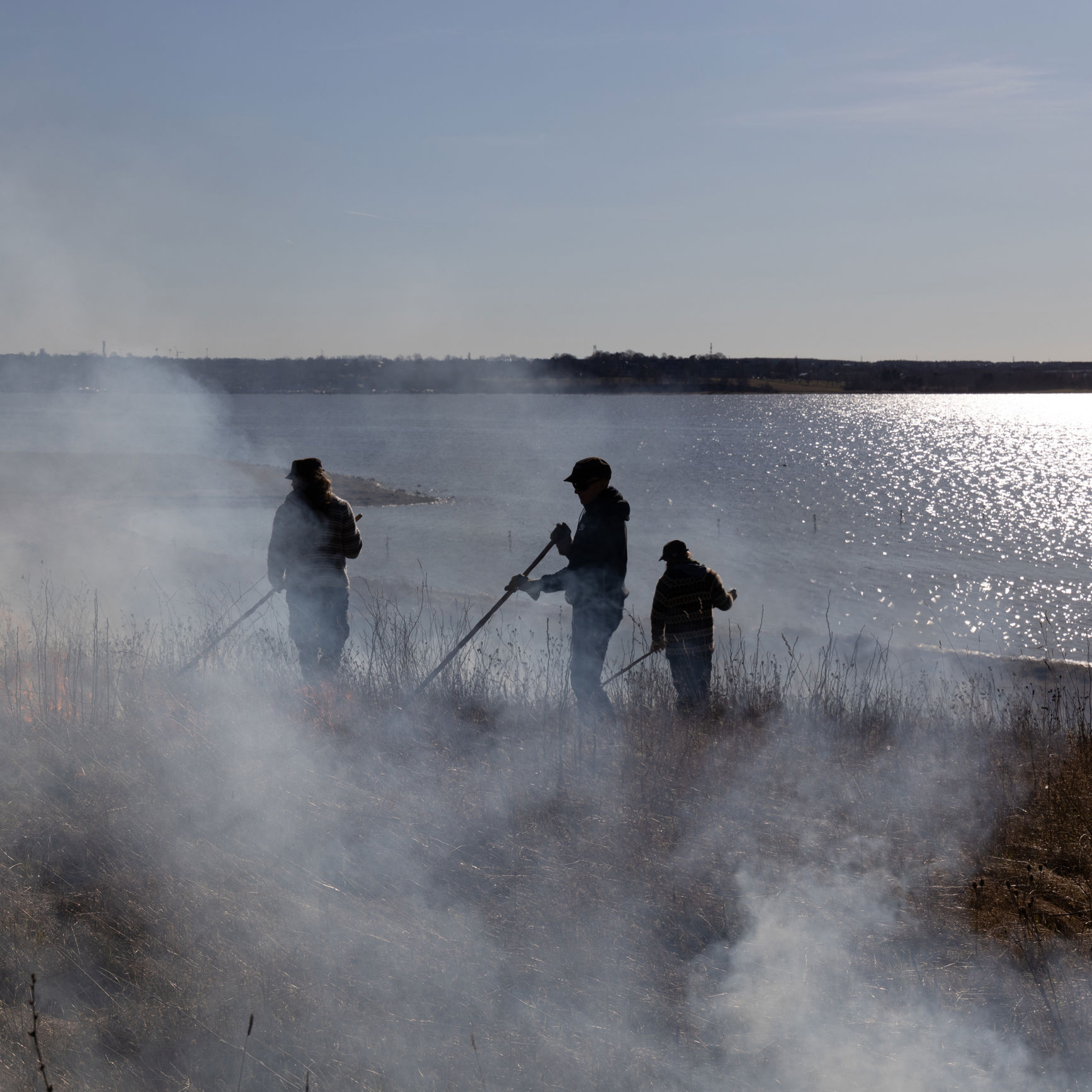 Afbrænding ved Vigen Strandpark med udsigt over fjorden og domkirken.